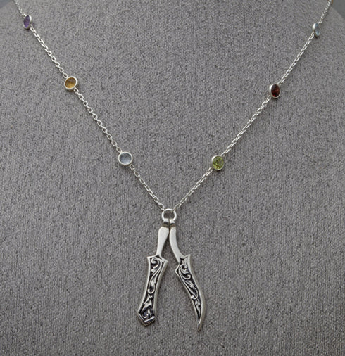 Khanda and Kirpan on faceted gemstone necklace